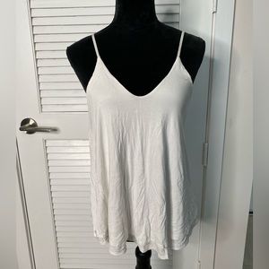 White cotton top. With a plunging back.